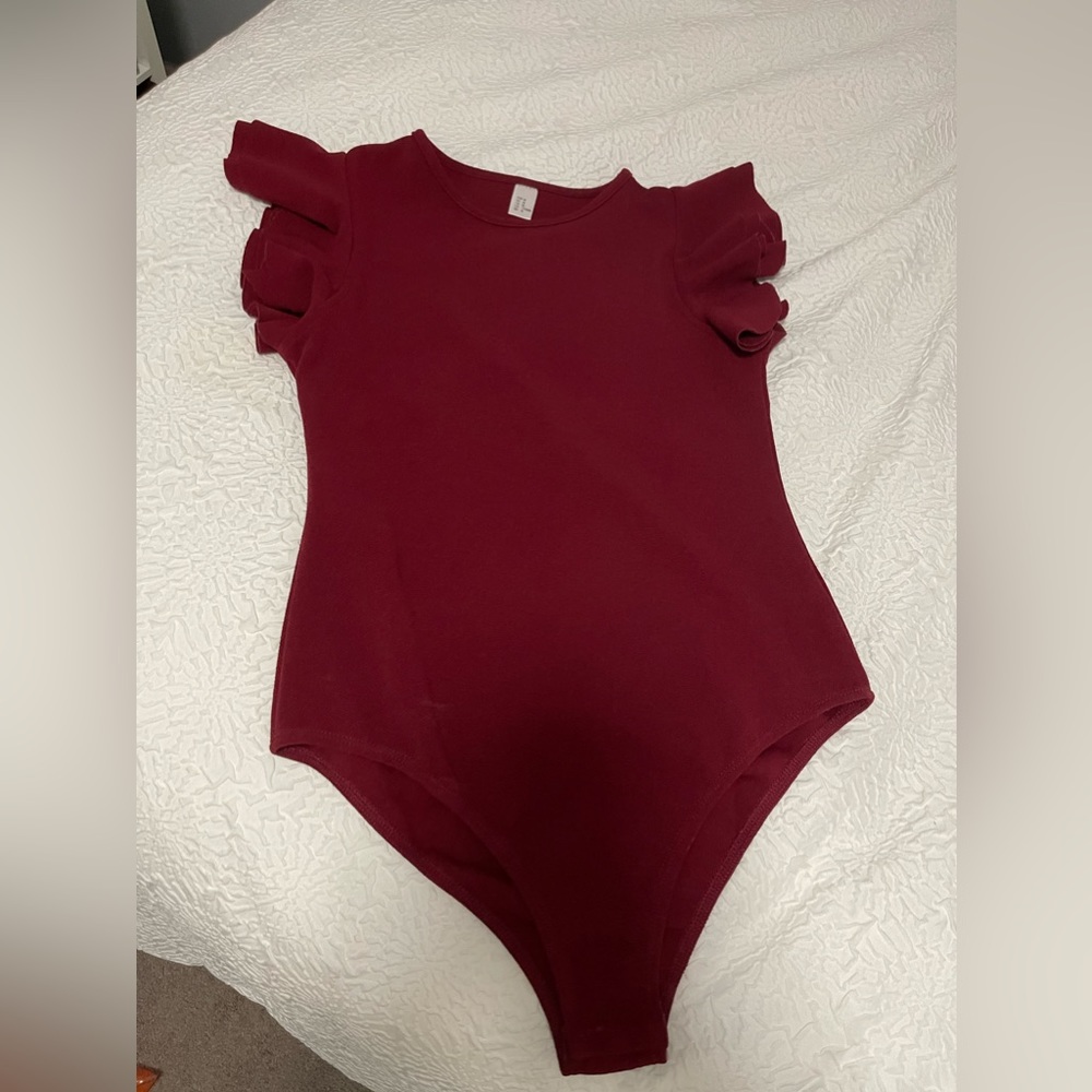 Garnet body suit. Only worn once, size MEDIUM! Super comfortable!